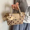 Bolso de Peluche Suede con Lunares Tipo Dumpling para Mujer Nuevo Modelo 2026 Bolso de Mano Meilade para el Trabajo Bolso Cruzado de un Solo Hombro Otoño