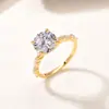 Anillo Redondo Grande de Moissanita en Plata S925 con Piedras Laterales en Forma de Lágrima Incrustadas en Oro, un Artículo Popular en Ebay para Mujeres