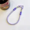 Nova Corrente de Mão de Corda de Couro Pingente para Capa de Celular Lanyard Curto Feminino Corda Colorida para Pulso Fivela Curta Corda de Couro Feminino