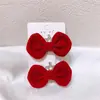 Série de Presilhas de Cabelo com Laço Vermelho Nova Transfronteiriça Acessórios de Cabelo de Veludo Fofos com Pérolas para Lado - Inverno Natal