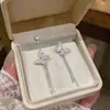 Brincos de Tarraxa com Laço de Zircônia e Longa Franja Estilo Cool Argola de Agulha Prateada Senso de Design Brincos de Nicho Leve Luxo Sensação de Alto Padrão