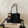 Bolso de mano estilo retro transfronterizo para mujer, moda otoño 2026 nuevo, gran capacidad, para ir al trabajo, de hombro, debajo del brazo