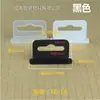 Gancho para agujero de avión hebilla de triángulo de plástico embalaje en caja de color gancho de plástico caja de papel plana tridimensional oreja colgante hebilla colgante