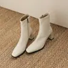 Temperamento retro superficie suave adelgazante elástico entrepierna de bota comercio transfronterizo punta cuadrada tacón alto botas Martin tubo corto negro botas de moda mujer