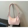 Bolsa de mão de design de alta qualidade para mulheres, nova versão coreana, moderna para o trajeto diário, bolsa versátil com um toque estiloso e sofisticado, bolsa de ombro