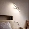 Lámpara de mesita de noche de dormitorio creativa minimalista moderna nórdica, lámpara de pared giratoria creativa personalizada, luz blanca, luz cálida, luz de tres colores, aluminio y hierro