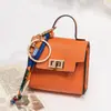 Mini cartera, accesorio de bolso de lujo ligero, mini bolso platino, adorno de llavero de coche lindo y creativo, estuche para lápiz labial y auriculares