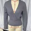 2024 Europa e América Amazon Outono e Inverno Sexy Moda Decote em V Profundo Cruzado Morcego Manga Longa AliExpress Malha Top