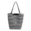 Nueva bolsa de lona de doble cara a rayas de bloques de color más vendida transfronteriza, gran capacidad, adecuada para ir al trabajo y uso casual, bolso de hombro para mujer