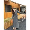 Roupas de Outono Combinadas com um Conjunto Completo de Cardigã de Manga Longa e Saias de Tamanho Grande para Mulheres para Ficar Magra