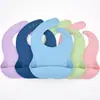 Nuevos baberos de silicona para bebés transfronterizos, baberos de silicona de grado alimenticio para bebés y niños pequeños, venta al por mayor de baberos para alimentar a bebés
