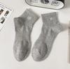 Calcetines para hombre primavera y verano calcetines de tubo fino algodón blanco bordado de letras calcetines deportivos absorbentes de sudor transpirables venta al por mayor
