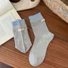 Calcetines de algodón para mujer con etiquetas de tela, calcetines apilados de bloques de color, puños acanalados en contraste, estilo coreano, estilo inglés, primavera y otoño, estilo Miu, calcetines de algodón a media pantorrilla