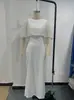 Vestido Longo Bodycon Elegante 2026 Novo Europeu e Americano Transfronteiriço com Patchwork de Cor Sólida e Mangas Flutuantes