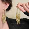 Aretes de borla de circonio de garra de alta calidad con aguja de plata 925 para mujer, temperamento de nicho de lujo ligero, aretes largos, aretes adelgazantes para rostro redondo