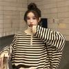 Suéter de cuello alto a rayas para mujer, otoño e invierno, nuevo abrigo holgado de estilo perezoso 2024, temperamento suave y glutinoso, top que combina con todo, moda