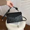 Bolso de mano pequeño cuadrado, simple y retro, para mujer, nuevo bolso tote casual de moda de primavera 2026, bolso de hombro moderno, bolso cruzado elegante