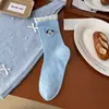 Calcetines dulces de oso estilo japonés para otoño e invierno para mujer, calcetines de encaje a media pantorrilla estilo universitario, calcetines casuales versátiles lindos de dibujos animados para mujer