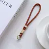 Cordón Tejido Ajustable de Doble Hebilla Auto-Bloqueante para Teléfono Móvil, Correa de Muñeca, Correa para el Cuello, Correa para Taza de Agua, Ventilador Llavero