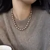 Cadena de Suéter Apilada de Doble Capa de Piedra Ojo de Tigre para Mujer Retro Nueva Popular Otoño e Invierno Collar Joyería de Nicho de Alta Gama
