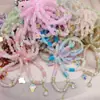 Moda Dulce y de Estilo Hada Estilo Japonés y Coreano de Moda Colgante de Flor de Crisantemo Pequeño Pulsera Curva de Tubo de Grava Pulsera Elegante para la Muñeca