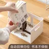 Soporte de libro para escritorio de estudiante con amortiguación y función de rebote, estantería antivuelco, caja de almacenamiento de escritorio con soporte de libro extensible y sujetalibros de escritorio