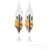 Pendientes de Borla de Cuentas de Arroz Hechos a Mano de Venta Caliente Europea y Americana Pendientes Largos Tejidos con Flecos de Estilo Étnico Bohemio para Mujer