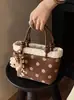 Bolso tipo cubo casual estilo coreano, nuevo bolso de mano otoño e invierno 2026, bolso de hombro y cruzado de moda con lunares único