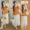 Conjunto de Maternidad: Elegante Atuendo de Verano en Color Calabaza, Top Estilo Muñeca con Elegantes Mangas Abullonadas, y Falda de Maternidad