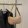 Bolsa de Palha Tecida Retro Baguete de Ombro Nova Moda Versátil Verão 2025 Bolsa de Ombro Simples Artística para Mulheres