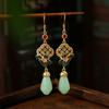 [Tecnologia de espelho] estilo maré nacional brincos antigos cor banhado a ouro esmalte imitação jade Hetian brincos de orquídea brincos