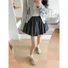 Falda corta plisada color arroz integral para mujer, primavera, otoño, invierno 2026 nuevo modelo, línea A, cintura alta, casual, adelgazante, falda midi plisada