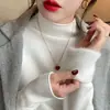 Suéter para mujer para otoño e invierno 2024, estilo nuevo, forrado de polar, engrosado, cuello medio alto, capa base, top de punto blanco, top cálido