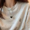 Collar de moda estilo hip hop para mujer, estilo frío, con diseño de nicho de circonita de color de alta calidad y cruz de acero de titanio dulce y fresco.