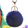 Al por mayor en stock Bola de pelo de imitación de conejo Rex de 8 cm llavero colgante lindo para mujer bolso de coche teléfono móvil colgante de felpa