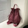 Mochila de diseño nicho transfronteriza 2026 para mujer, ligera de verano, casual, con cordón, versátil para el trabajo y los viajes