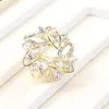 Broche de flor de cristal de la nueva moda coreana, todo a juego, para mujer, aleación caliente, diamante, broche al por mayor, hebilla para pañuelo de seda