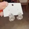 Pendientes de Plata de Ley 925 Envueltos con Alambre en Forma de C para Mujer Diseño de Nicho Pendientes de Lujo Accesible Estilo Hong Kong Nuevo Estilo 2025