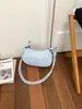 Bolsa de axila de luxo leve de nicho de alta qualidade para mulheres, novo modelo de verão 2026, bolsa de ombro/transversal para o dia a dia, requintada e versátil