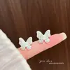 Pendientes de mariposa de perlas y diamantes completos para mujer, sencillos y exquisitos, sensación de alta gama, lujo ligero, nicho, pendientes elegantes, accesorios para orejas versátiles
