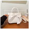 Moda Lazo Primavera Nuevo Dulce Fresco Moda Bolso Cuadrado Pequeño Bolso de Hombro Cruzado Simple Transfronterizo Bolso para Mujer