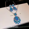 Conjunto de Pendientes Ovalados con Incrustaciones de Diamante y Aguja de Plata Estilo Palacio Vintage Exquisitos Accesorios de Fiesta de Lujo Ligero de Gama Alta para Mujeres