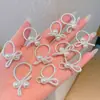 Accesorios Coreanos para Niños: Gomas para el pelo plateadas con lazo, Anillos para el pulgar con perlas, Cuerdas para el pelo trenzadas, Gomas para el pelo de bebé
