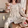 Pijama de outono para mulheres, com estilo princesa de algodão nuvem, design doce e charmoso, mangas compridas, calças compridas, gola redonda e estilo pullover.. Este é um conjunto de pijamas adequado para atacado transfronteiriço