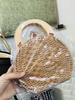 2019 Nova bolsa de ombro redonda de palha japonesa bolsa transversal de férias feminina retrô portátil de rattan bolsa ins