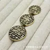 Botones metálicos negros con respaldo dorado y forma redonda para trajes, abrigos de lana tejidos, botones decorativos simples y versátiles para coser a mano