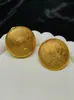 Pendientes de moda de arena dorada de alta venta pendientes de oro de 24k joyería femenina negra pendientes de moda europeos y americanos joyería para fiesta de bodas en stock