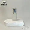 Nueva Botella Gotero Transparente con Prensa Giratoria de 30 ml del Fabricante Botella Dispensadora de Aceite Esencial Botella de Vidrio de Grado Alimenticio con Rosca