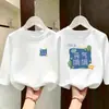 Camiseta de manga larga para niño 100% algodón top infantil colección otoño 2026 casual cuello redondo versátil camiseta básica para niños mayores