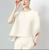 026 Top plisado para mujer, diseño moderno, estilo nicho Issey Miyake, nueva camiseta asimétrica holgada talla grande, elegante para mujer